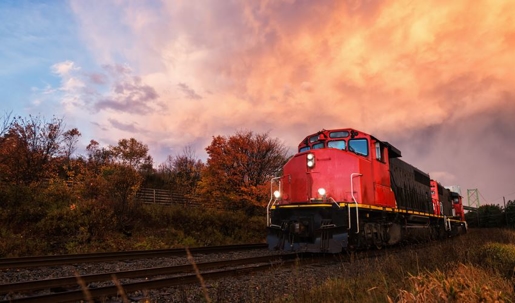 train on the track at sunset
